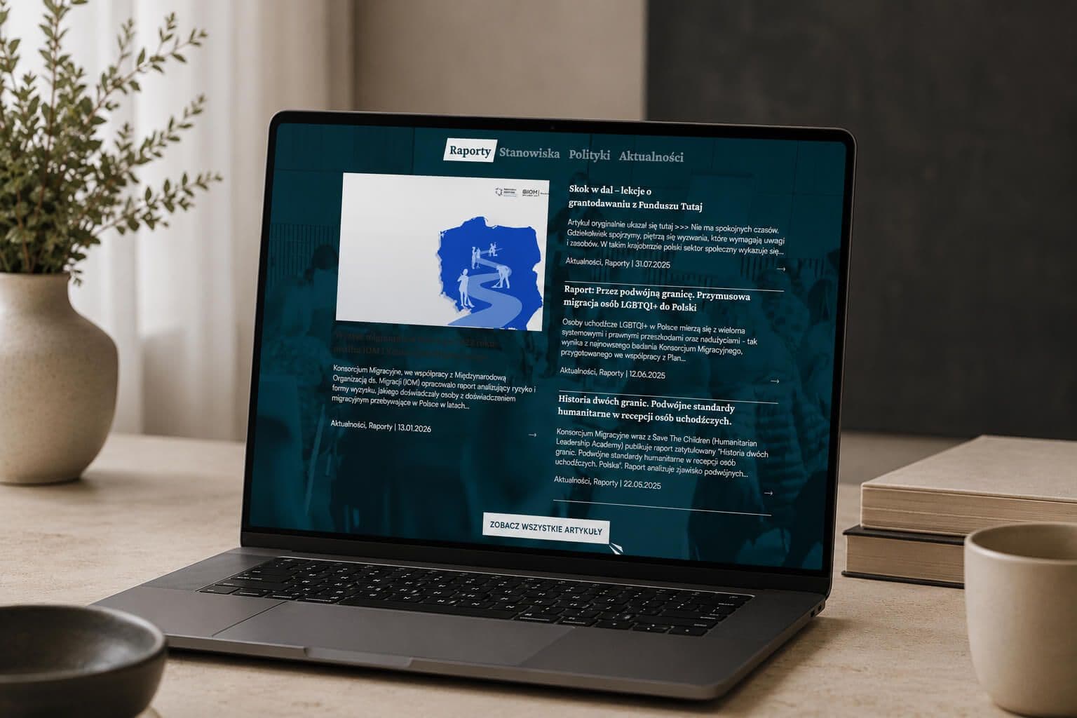 strona głowna konsorcjum-migracyjne na laptopie